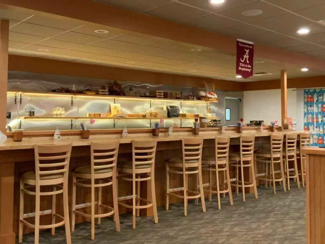 Spacious sushi bar with wooden stools and open kitchen at Bayou Fresh Seafood & Deli a Asian Fusion Restaurant in Jasper