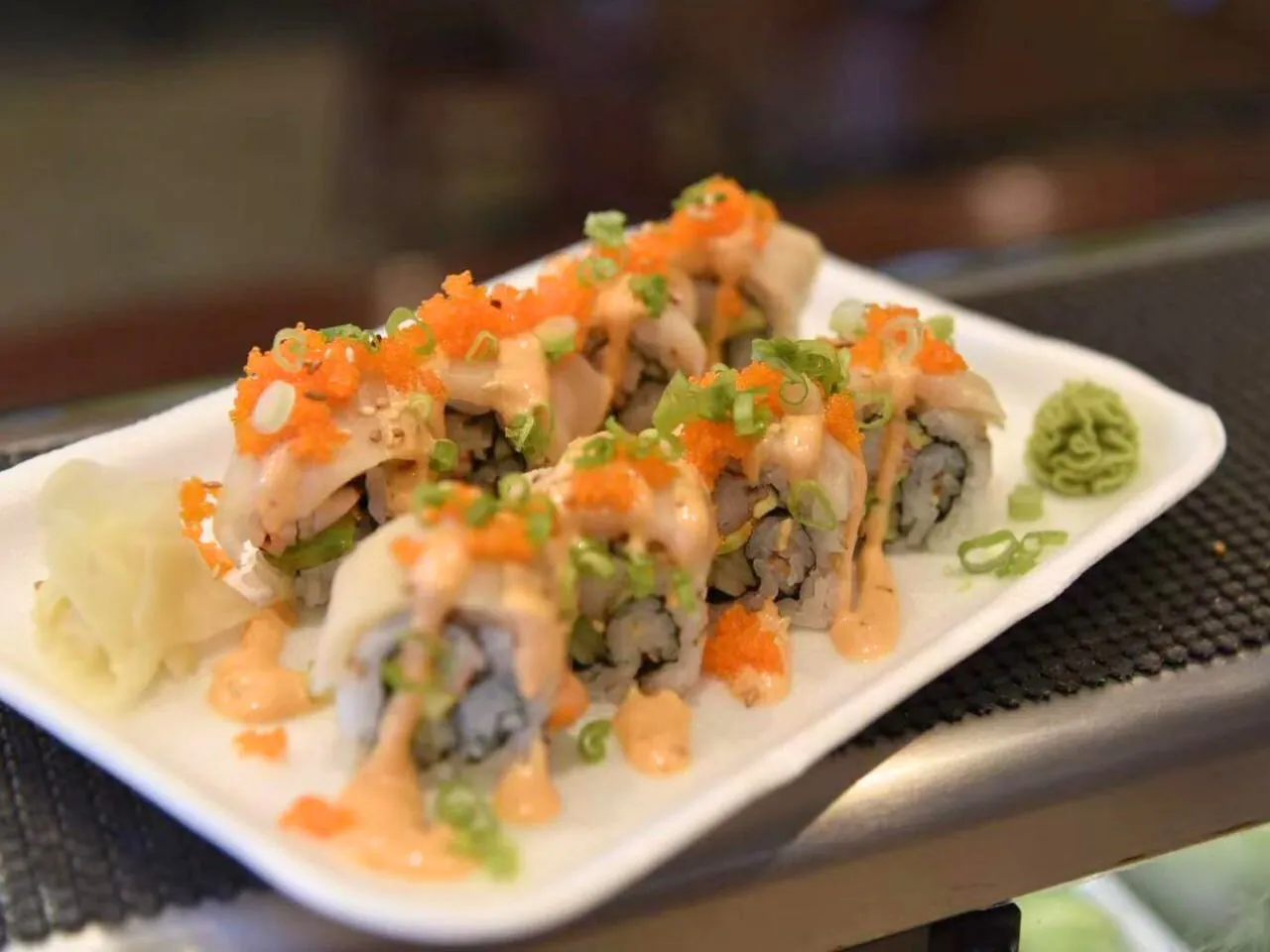 Sushi roll with seafood, tobiko and spicy sauce at Bayou Fresh Seafood & Deli a Asian Fusion Restaurant in Jasper
