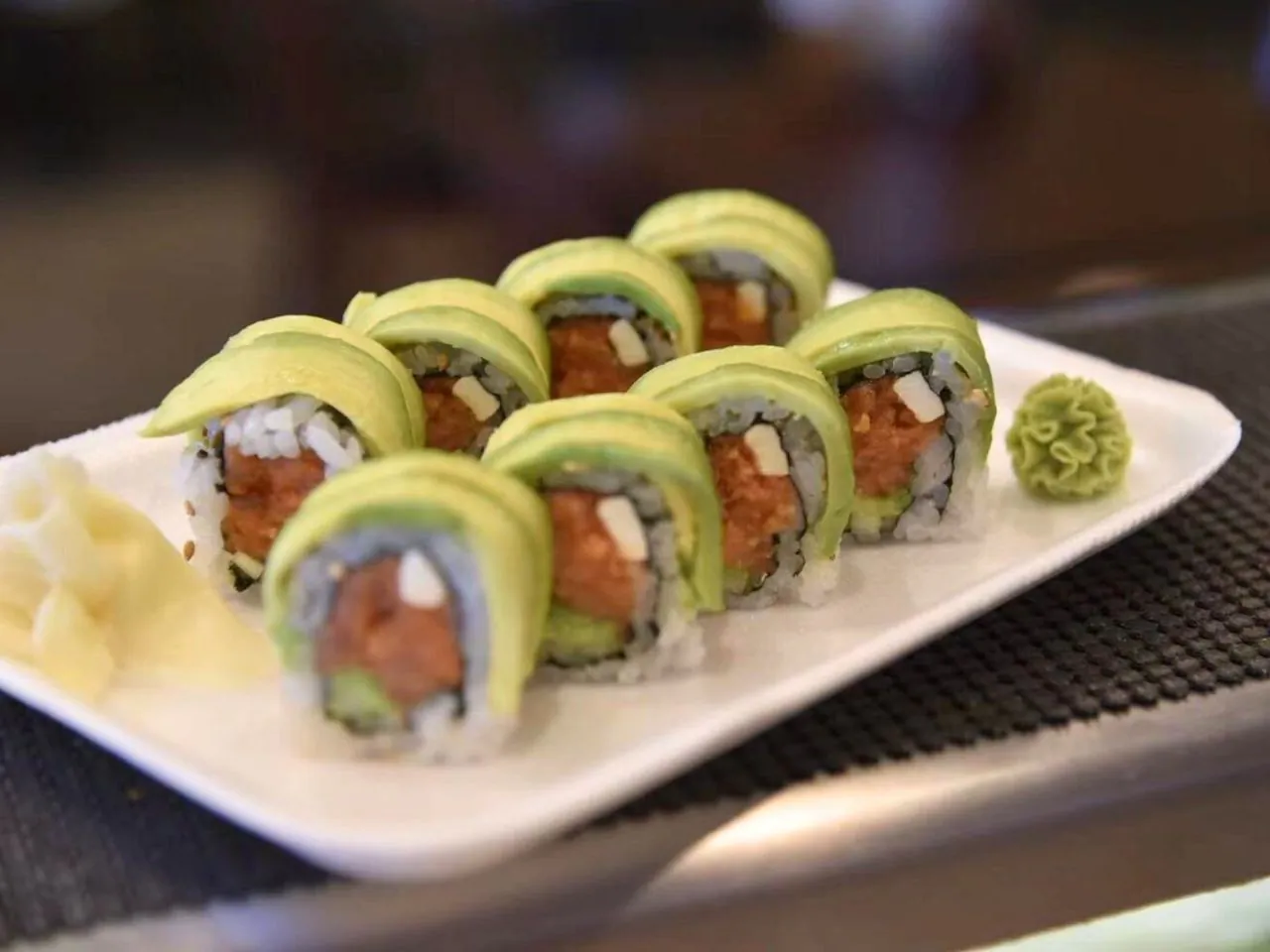 Sushi roll with spicy tuna and avocado slices at Bayou Fresh Seafood & Deli a Asian Fusion Restaurant in Jasper