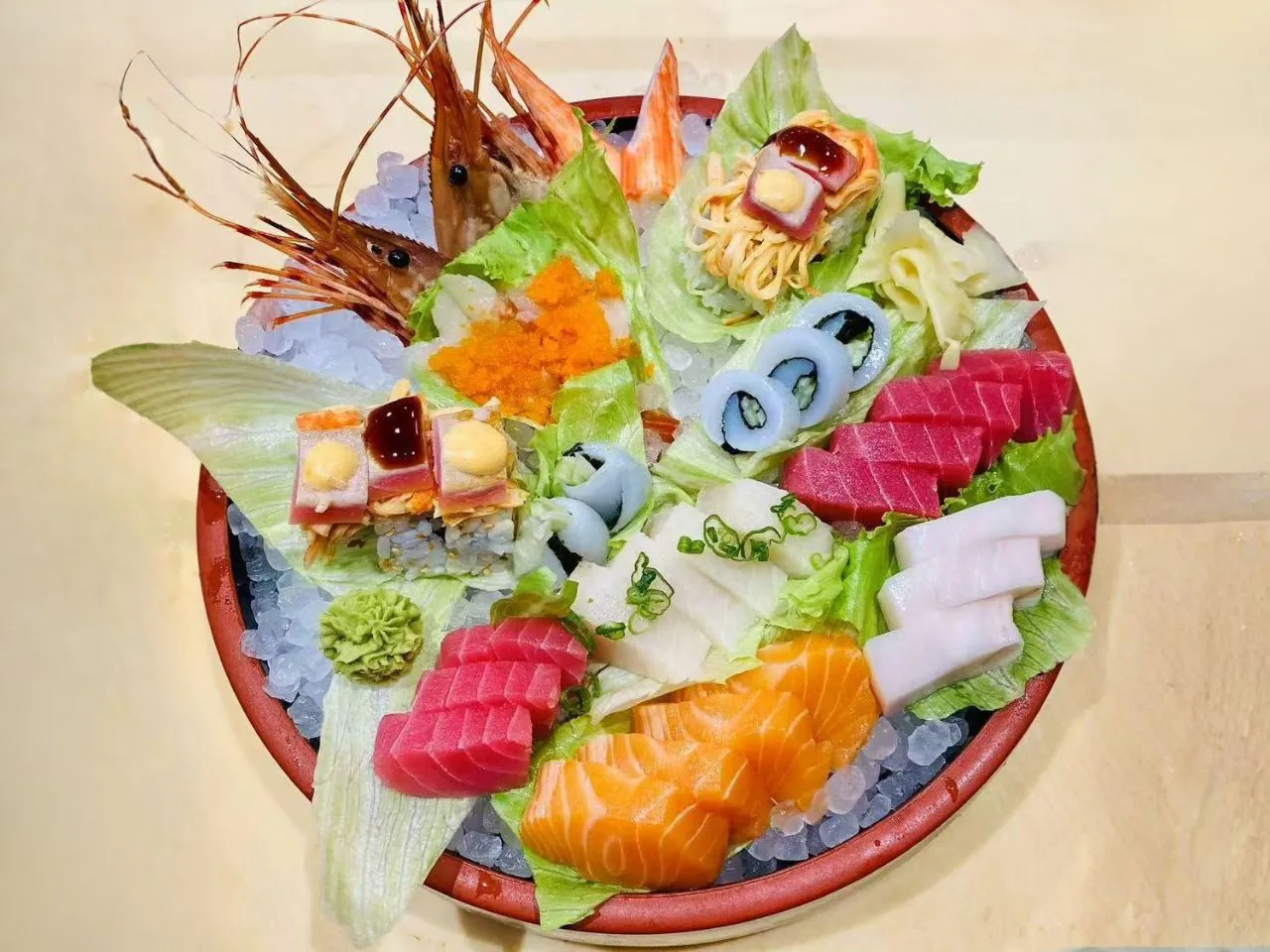 Assorted sashimi on ice with fresh veggies at Bayou Fresh Seafood Grill & Sushi a Asian Fusion Restaurant in Jasper