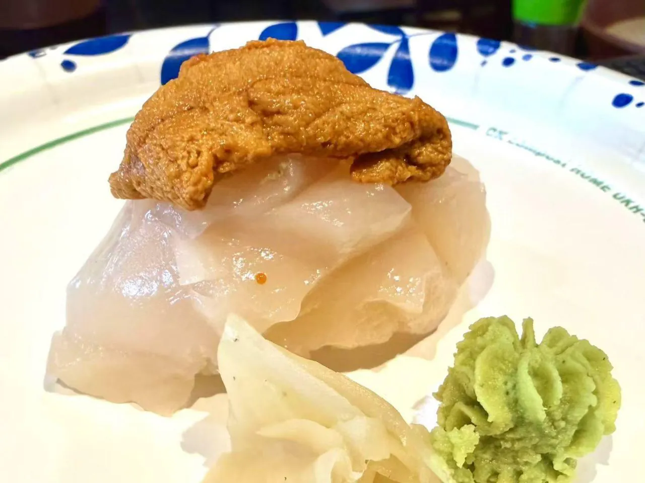 White fish nigiri topped with fresh sea urchin at Bayou Fresh Seafood Grill & Sushi a Asian Fusion Restaurant in Jasper